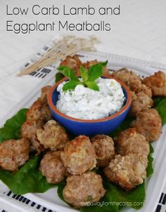 low carb lamb and eggplant meatballs on a platter with sour cream