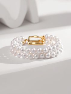 Double Water Pearl beaded gold bracelet makes the perfect gift for her. All of our jewelry comes in a high quality box with a pouch and silver polishing cloth which makes it a perfect gift for any occasion. Our stylish bracelets is easy to pair with any wardrobe whether casual or for work. They are perfect for gifting or as a self gift.  🏮PERFECT FOR🏮 * Valentines gift for her * Gift for her * Mother's Day gift * Girlfriend gift * Best friend gift * Sisters gift idea * Mother of the bride Gift * Mother of the Groom gift * Bridal jewelry * Bridesmaid earrings and Maid of Honour gifts * Birthday gift for her * Anniversary Gift for her * Christmas gift for her * Pass exams gift 🏮SIZE AND MATERIALS🏮 Bracelet Length: 18 cm Pearl Diameter: 6-6.5 mm Material: 18k gold, Pearl 🏮ABOUT🏮 Each pi Leather Pearl Necklace, Ladies Rings, Retro Bracelet, Luxury Bracelet, Stylish Bracelet, Freshwater Pearl Bracelet, Wedding Jewelry Bracelets, Bar Bracelets, Color Vintage