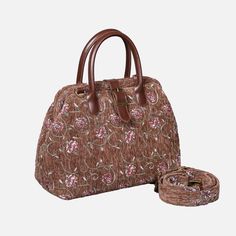 With a nod to the Victorian era, MCW’s freshly combines the classic and elegant design of the traditional carpet bag with a textural and tactile twist.The main body of purse-sized bags is made with thick chenille carpets. The handles and belts are genuine leather with heavy cotton canvas lining. Six bronze stands at the bottom allow the bag to stand stably. Every bag comes with a detachable and adjustable shoulder strap (55 inches) made from the same chenille as the bag and fixed with high-quali Brown Evening Bag With Rolled Handles, Elegant Tapestry Tote Bag, Elegant Tapestry Bags With Detachable Handle, Elegant Tapestry Shoulder Bag With Double Handle, Elegant Tapestry Shoulder Bag With Detachable Handle, Elegant Tapestry Bag For Daily Use, Elegant Tapestry Satchel With Detachable Strap, Rose Carpet, Victorian Carpet