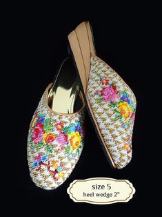 Peranakan beaded slippers, also known as kasut manek, meaning beaded shoes, is worn by a Nyonya to complete her Sarong Kebaya outfit. The colours and motifs for Nyonya beadwork often reflect a combination of Chinese, Malay, Indian and European influences.  In the past, young female Nyonyas were required to make a pair for themselves and their husbands to be. Kasut manek suitable to wear with sarong-kebaya for a traditional look, and suitable for a casual look too. Panel is cushioned for comforta Traditional Handmade Slippers With Round Toe, Traditional Embroidered Round Toe Slippers, Traditional Flat Heel Summer Slippers, Traditional Multicolor Slip-on Slippers, Traditional Multicolor Closed Toe Slippers, Traditional Summer Slippers With Round Toe, Traditional Flat Slippers For Summer, Traditional Embroidered Slip-on Slippers, Traditional Round Toe Slippers For Summer