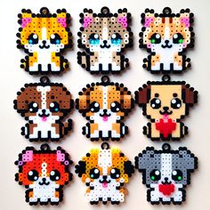 six perler bead dogs with different colors and designs on them, all made out of plastic beads