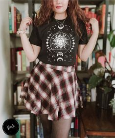 Embrace the stars with our Celestial Boho Sun & Moon Phase Shirt. Made with Comfort Colors fabric, this whimsigoth T-shirt blends spiritual and hippie elements for a unique look. Ideal as a gift for her, this goth tarot tee adds a touch of celestial charm to any wardrobe. 🌞🌜 If you like the design but would prefer a Comfort Colors Heavyweight Tee, take a look at this one -> https://forestfablesshop.etsy.com/listing/1743736331/celestial-boho-sun-shirt-moon-phase-tee  Here's what you need to kno Moon Phases Shirt, Celestial Boho, Hippie Goth, Celestial Sun, Boho Sun, Boho Shirt, Vintage Sun, Sun Shirt, Boho Shirts