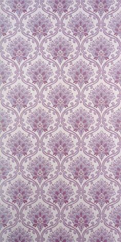 a purple and white wallpaper with an intricate design