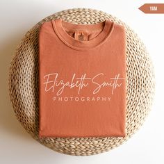 This Comfort Colors Custom Photographer Shirt is a thick, structured tee that's also super soft and breathable. The soft-washed, garment-dyed fabric brings extra coziness to your wardrobe while the relaxed fit makes it an excellent daily choice, perfect as an everyday t-shirt or great as a gift!  Please note that due to variations in monitors & lighting the colors may look slightly different in real life. The print is printed into the fabric. This provides an extremely durable and professional look, but can cause it to look slightly less vibrant in person. DETAILS * 100% ring-spun cotton * Design is high quality print * Printed and shipped from the USA * Fabric weight: 6.1 oz/yd² (206.8 g/m²) * Relaxed fit SIZING * All our t-shirts are UNISEX. Please refer to sizing chart in the photos for Photography Business Shirt, Photography Tshirt, Gift For Photographer, T-shirt Photography, Photographer Logo, Business Shirt, Photographer Shirts, Gifts For Photographers, Business Gift