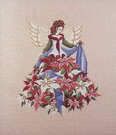 a cross stitch pattern with an angel surrounded by poinsettis and lilies