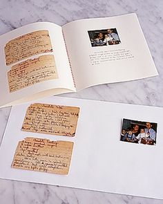 an open book with writing on it and two pictures in the pages next to it