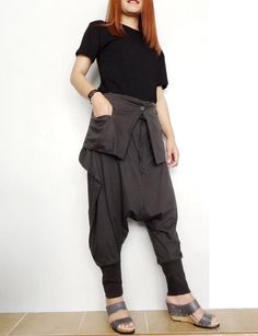 Harem Drop Crotch Pants Asymmetric Trendy Brown Cotton Blend image 5 Asymmetrical Cotton Bottoms For Fall, Trendy Asymmetrical Cotton Bottoms, Trendy Asymmetrical Bottoms With Pockets, Casual Asymmetrical Cotton Bottoms, Baggy Alternative Bottoms For Spring, Casual Trousers For Alternative Fashion, Casual Black Bottoms With Asymmetrical Hem, Fall Streetwear Bottoms With Buttons, Baggy Asymmetrical Bottoms For Spring