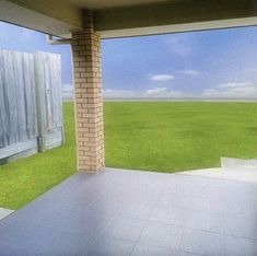 an open porch with a view of a green field and blue sky in the background