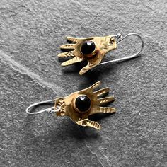 Unique Black Brass Jewelry, Black Brass Spiritual Jewelry, Artisan Black Brass Jewelry, Symbolic Black Hand Cast Jewelry, Traditional Hand Cast Brass Jewelry, Black Oxidized Brass Jewelry, Handmade Black Brass Earrings, Handmade Black Brass Jewelry, Hand-cast Brass Dangle Earrings