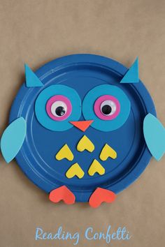 a blue paper plate with an owl on it and the words reading confetti