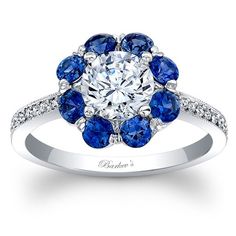 a diamond and blue sapphire flower ring