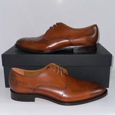 Elevate Your Formal Attire With The Allen Edmonds Lucca Oxford Lace-Up Derby Shoe. This Shoe Features An Almond Toe Shape, Lace-Up Closure, And A Brown Color That Complements Any Outfit. The Upper And Lining Material Is Made Of High-Quality Leather, Ensuring Both Durability And Comfort. The Outsole Is Also Made Of Leather, And The Shoe Has A D Width, Making It Suitable For Most Foot Sizes. This Shoe Is Brand New, Comes With A Box, And Is Made In Italy. Add A Touch Of Sophistication To Your Wardr Designer Wingtip Formal Dress Shoes, Designer Wingtip Dress Shoes For Formal Occasions, Designer Formal Wingtip Dress Shoes, Designer Formal Wingtip Leather Shoes, Elegant Oxfords With Removable Insole, Elegant Fitted Oxfords With Removable Insole, Formal Fitted Dress Shoes With Removable Insole, Fitted Dress Shoes With Removable Insole For Formal Occasions, Formal Wingtip Leather Shoes With Removable Insole