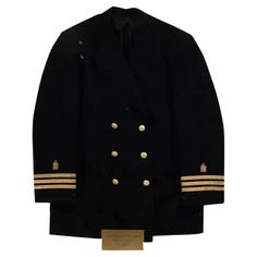 A WWII era US Army Jewish Military Uniform Chaplains jacket or coat. The military jacket is adorned with gold tone buttons and trim on sleeves, decorated with Jewish insignias, the embroidered Star of David. Presented in a shadow box with a gold tone plate showing detailed information about the jacket. Second World War Era USA Army Military Uniforms, Clothes and Accessories, and Collectibles. Dimensions: On case 37 1/2 x 32 1/2 in. All measurements are approximate. Condition Good vintage conditi Marine Corps Dress Blues, Usa Army, Dress Blues, Military Uniforms, Military Uniform, Star Of David, The Military, Second World, Marine Corps