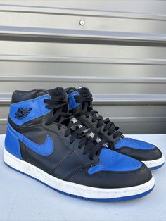 Elevate your sneaker game with these Jordan 1 Retro High OG Royal 2017 sneakers. These shoes are perfect for any occasion, whether it's activewear or casual wear. The black leather upper material and solid pattern make these sneakers versatile yet stylish. Featuring a lace-up closure and high-top shoe shaft style, these sneakers offer both comfort and ankle support. The rubber cleat type and outsole material provide durability and traction for gym and training activities, track and field, walking, skateboarding, yoga, and basketball. These Air Jordan 1 Retro High OG Royal 2017 sneakers are a must-have for any sneakerhead. Comes with replacement box Training Activities, High Top Shoe, Train Activities, Jordan 1 High Og, Air Jordan 1 Retro High Og, Air Jordan 1 Retro High, Ankle Support, Sneaker Games, Jordan 1 High