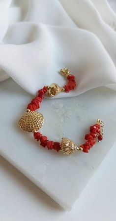 Red Coral Bracelet with Gold plated 925 Sterling Silver Connectors * SHIPPING * Your order will be shipped within 1-3 business days from your purchase. You can choose between 2 shipping methods: STANDARD SHIPPING (without tracking) or REGISTERED MAIL (with tracking). * GIFT PACKAGING * If you want the gift box, you can buy it during your order. We will package your jewel in a pretty, handcrafted package. Thank you for your visit. Elegant Red Bracelets For Beach, Coral Bracelet, Red Coral, Gift Packaging, 925 Silver, Gold Plate, Gift Box, Coral, Beaded Bracelets