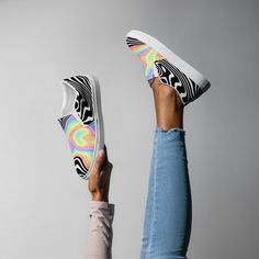 Step into a pool of psychedelic style with our mind-bending Trippy RGB Melt canvas shoes! These aren't your ordinary slip-ons - we've infused it with a fusion of modern vibes and trippy goodness that will take your shoe game to a whole new level. Wear these when you're grooving to the beats at a music festival, unwinding at a beach bonfire, or simply vibing in your own space - these psychedelic shoes are your companion for steppin' in style. Embrace the trippy vibes, express your unique spirit, and let your style be a statement piece that sparks conversations and good times. * 100% polyester canvas upper side * Ethylene-vinyl acetate (EVA) rubber outsole * Breathable lining, soft insole * Elastic side accents * Padded collar and tongue * Printed, cut, and handmade Important: This product i Artistic Multicolor Sneakers For Summer, Artistic Multicolor Summer Sneakers, Trendy Sneakers For Skateboarding In Summer, Multicolor Canvas Shoes For Summer Streetwear, Trendy Multicolor Sneakers For Skateboarding, Trendy Multicolor Canvas Shoes With Vulcanized Sole, Spring Multicolor Canvas Shoes For Streetwear, Multicolor Slip-on Skate Shoes For Streetwear, Weirdcore Aesthetic