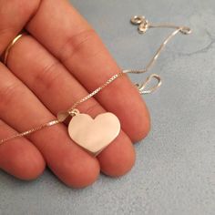 925 Silver Heart - Heart Necklace - Heart Charm - Heart Pendant - Love Necklace - Dainty Necklace - Women Charm- Girl Necklace- Gift For Her . . . . . . . . . . . . . . . . . . . . . . . . . . . . . . . . . . . . . . Looking for a thoughtful gift for your loved one? You will love this high quality 925 Sterling Silver Heart Necklace. This is a perfect gift for your girlfriend or wife. This lovely Sterling Silver Heart Charm Necklace necklace is made to order. Purchase one for your mom or anyone s Silver Dainty Heart Necklace, Dainty Sterling Silver Heart Necklace For Valentine's Day, Silver Heart Pendant Jewelry With Heart Print, Sterling Silver Heart Beads Pendant Necklace, Sterling Silver Heart Charm Necklace For Valentine's Day, Heart Necklace With Heart Print For Gifts, Sterling Silver Heart Pendant Necklace For Valentine's Day, Sterling Silver Heart Charm Pendant Necklace, Personalized Sterling Silver Heart Necklace With Round Pendant