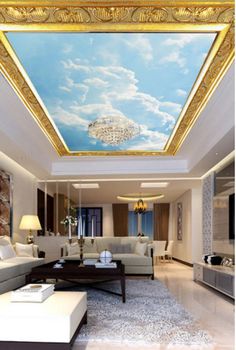 a living room filled with furniture and a sky mural on the wall above it's ceiling