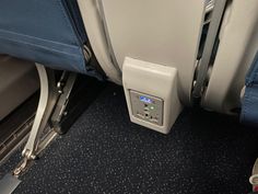 the control panel on an airplane seat