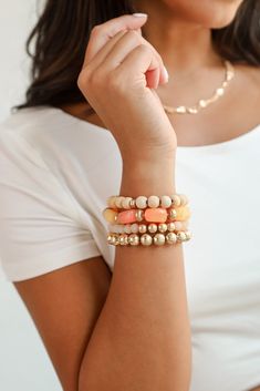 You'll shine brightly on every occasion when you pair the Ellie Orange Beaded Bracelet Set with your evening ensembles! This set of four bracelets is made of orange, tan beads, and gold beads. Wear them all together, or separately, either way you'll love them! Set Beaded One Size | Diameter 2.5” Cheap Orange Bohemian Beaded Bracelets, Cheap Casual Orange Stretch Bracelet, Cheap Orange Bracelet Jewelry, Cheap Orange Round Bracelets, Cheap Orange Casual Stretch Bracelet, Cheap Orange Beaded Bracelets For Party, Cheap Orange Beaded Stretch Bracelet, Cheap Orange Bracelet With Large Beads, Affordable Orange Beaded Stretch Bracelet