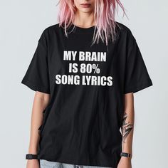 Show off your love for music with our My Brain is 80% Song Lyrics T-shirt. Made from 100% cotton, this unisex shirt is not only trendy but also comfortable. Perfect for any music lover, it makes a great gift that will surely spark conversations about your shared love for songs and lyrics! Shirts With Lyrics, Song Lyric Shirts, White Music-themed T-shirt With Text Print, Cheap Music-themed T-shirt With Text Print, Music Passion, Lyric Shirts, Music-themed Slogan T-shirt With Short Sleeves, My Brain, Music Lover