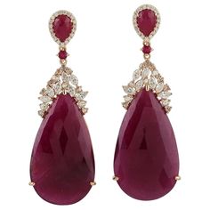 Cast from 18 Karat gold. These stunning earrings are hand set in 43.72 carats Ruby and 1.36 carats of sparkling diamonds. FOLLOW MEGHNA JEWELS storefront to view the latest collection & exclusive pieces. Meghna Jewels is proudly rated as a Top Seller on 1stDibs with 5 star customer reviews. All items manufactured by us are handmade and can be customized or redesigned. Composition Size-53X18 MM Total Weight-16.52 Gold Weight(Gms)-7.504 Diamond Wt(Cts)-1.36 Ruby Wt(Cts)-43.72 Ruby Drop Earrings, Kelly Rutherford, Sterling Silver Flatware, Gold Diamond Earrings, Antique Earrings, Stunning Earrings, Lovely Jewellery, Blake Lively, Jewelry Companies