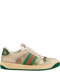 Influenced by classic trainers from the '70s, the Screener sneakers—named for the defensive sports move—feature the Web stripe on the side and vintage Gucci logo, treated for an allover distressed effect. A pastiche of different influences that span across decades, the Pre-Fall 2019 collection continues to reference old school shapes and materials inspired by vintage sportswear. Gucci Lace-up Sneakers With Logo Detail, Luxury Gucci Sneakers With Embroidered Logo, Gucci Designer High-top Sneakers With Embroidered Logo, Designer Gucci High-top Sneakers With Embroidered Logo, Casual High-top Sneakers With Branded Heel, Gucci Leather High-top Sneakers With Embroidered Logo, Gucci Leather Sneakers With Embroidered Logo, Gucci Sporty Sneakers With Logo Detail, Gucci Low-top Sneakers With Logo Detail