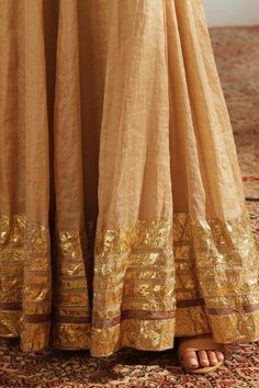 Beige kalidar lehenga featuring placement embellished lapa work. Paired with a two-tone peplum blouse and dupatta with lapa lace border., Fit: Relaxed Lehenga Peplum, Tissue Silk Lehenga, Silk Lehenga, Peplum Blouse, Lace Border, Sweetheart Neck, Full Sleeves, Ethnic Wear, Set For Women