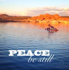 a person on a surfboard in the water with words peace be still above them