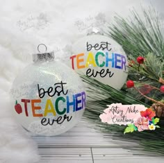 two christmas ornaments with the words best teacher ever on them