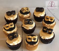 cupcakes with masquerade masks on them are arranged in a pyramid shape