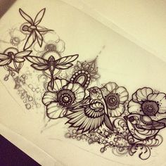 an artistically designed piece of paper with flowers and birds on it's side