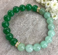 "✦Gemstone: Jade ( Color dyed), Aventurine ✦Color: Green ✦Shape: Round ✦Length: 5''-9'' ✦Bead Size: Round Bead:10mm ✦QTY: 1 pcs / package ✦✦Please measure your wrist size, then order the bracelet. This jade bracelet is dyed color, but it is a beautiful bracelet gift for women, bridesmaid and little girls 10mm Jade Bracelet, Green Aventurine Bracelet, Crystal Bracelet, Stretchy Bracelet, Healing Jewelry, Man, Woman, Good Luck Bracelet Jade is a symbol of serenity and purity. It signifies wisdom g Green Gemstone Stretch Bracelet Gift, Green Aventurine Stretch Bracelet Gift, Green Aventurine Bracelet, Aventurine Bracelet, Healing Gemstone Bracelets, Reiki Jewelry, Jade Color, Good Luck Bracelet, Amazonite Bracelet