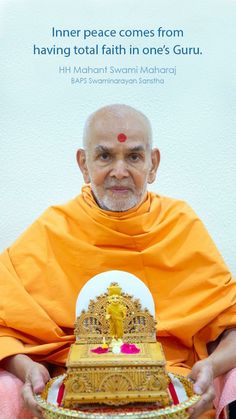 an old man holding a tray with a statue on it