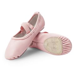 a pair of pink ballet shoes on top of each other