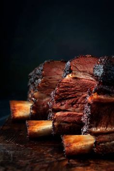 sliced up steak on a cutting board with some slices cut out to show the meat