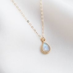 Our Moonstone Teardrop Necklace is the perfect little gemstone necklace to add to your collection. Moonstone soothes emotional instability and stress by stabilizing emotions, providing calmness. Wear it when you need a little boost! DETAILS Necklace length: 16" with 2" extender Gold filled -or- sterling silver spring clasp, chain, & findings 7mm x 10mm moonstone charm with vermeil -or- sterling silver casing Moonstone Teardrop Necklace, Dainty Gemstone Necklace, Silver Gold Jewelry, Detailed Necklace, Healing Necklace, Gold Necklace Layered, Teardrop Necklace, Moonstone Necklace, Moonstone Jewelry