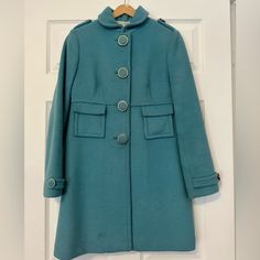 Banana Republic Teal Coat Beautiful Color And Beautiful And Unique Coat. Size Xs Made In Philippines Shell: Exterior - 80% Wool Lining Is 20% Nylon On The Under Side Of The Arm - One Has A Few Spots And One Is A Little Faded. Not Noticeable When Wearing. Please See Photos. Happy To Send More Pet Free And Smoke Free Home Blue Double-breasted Pea Coat With Button Closure, Under Side, Vintage Blue Single-breasted Outerwear, See Photo, Banana Republic, Philippines, Beautiful Colors, Jackets & Coats, Jackets For Women