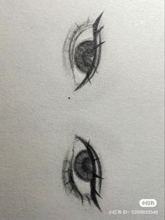 two drawings of different shapes and sizes of eyeballs, one is black and the other is white