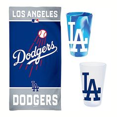 los angeles dodgers beach towel, shot glass and pinata wrapper set on white background