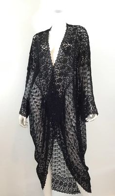 For Sale on 1stDibs - Beautiful Victorian lace cover up with snap closures carefully placed along the draped front. Cover up has some tearing due to the delicate fabric and Fitted Lace Cover-up With Lace Trim, Fitted Lace V-neck Cover-up, Elegant Black Festival Cover-up, Long Sleeve Lace Trim Cover-up, Long Sleeve Lace Cover-up With Lace Trim, Lace Long Sleeve Beach Cardigan, Beach Lace Long Sleeve Cardigan, Long Sleeve Lace Cardigan For Beach, Elegant Long Sleeve Festival Cover-up