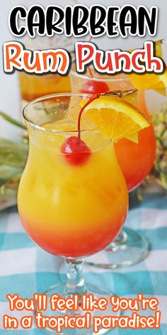 two glasses filled with orange juice and garnished with a cherry on the rim