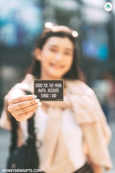 a woman holding up a sign that says do you care for the man?