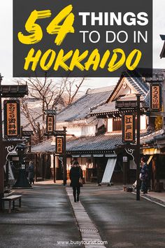 a man walking down a street with the words, 54 things to do in hokido