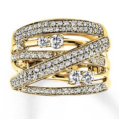 two gold rings with white diamonds on top and bottom, set in 18k yellow gold