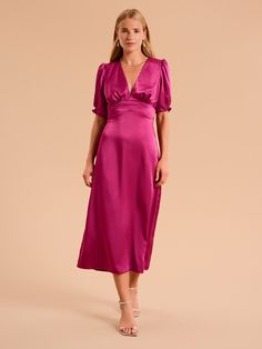 Odette is elegance with an edge. The 3/4 length sleeves are gathered at the bottom to create a feminine silhouette offset with a deep v-neckline. With an open back with sash detail, this dress in deep magenta recycled satin is a date night dream. Odette Dress, Deep Magenta, Feminine Silhouette, British Indian, Holiday Dresses, Denim Top, The 3, Brunei, Occasion Wear