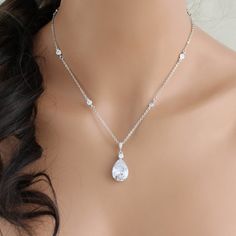 Beautiful cubic zirconia teardrop Bridal necklace with some extra sparkle added around the neckline. - PLEASE ALLOW APPROX 7-10 BUSINESS DAYS FOR COMPLETION BEFORE SHIPPING.- Handcrafted with Premium Cubic zirconia stones- Stones are clear in color- Available in rose gold, rhodium or yellow gold finish- Necklace measures 16 inches and extends to 18 inches- Handcrafted in the US in my studio- Nickel free and hypoallergenicThis is an original design by © Treasures by Agnes FOR MATCHING PIECES SIMP Gold Wedding Necklace, Wedding Jewelry Silver, Silver Crystal Necklace, Gold Necklace Wedding, Rose Gold Wedding Jewelry, Crystal Wedding Jewelry, Jewelry Rose Gold, Wedding Necklaces, Crystal Bridal Earrings