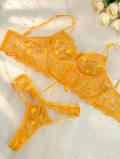 In yellow hue, crafted from soft lace fabric, this lingerie ensemble is adorned with delicate pearl flower patches, exuding both cuteness and allure. Its playful charm effortlessly blends with its innate sensuality, creating a captivating allure. 💙🌸✨ Material: Made of 95% nylon, 5% cotton. Exquisite Embroidery Design: The lingerie set features intricate embroidery, adding delicate patterns for an alluring appeal. Comfortable and Form-Fitting: Lightweight Padded-free Underwire Bra. Crafted from Yellow Lingerie, Yellow Pearl, Lingerie Party, Flower Patch, Fishnet Stockings, Lace Lingerie Set, Flower Lace, Lace Lingerie, Blue Pearl