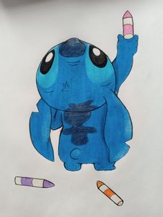 a drawing of a blue cartoon character holding a pencil in one hand and pointing to the left