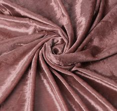 The lush texture of velvet gives brides and wedding planners the canvas to create breathtaking ceremonies and receptions. This 10 yards Velvet Fabric Roll lends its sumptuous appeal to wedding apparel, tabletops, window coverings, and more. The rich, opulent color and sheen of this luxurious fabric infuses sophistication into any room or apparel design. Velvet has a soft texture, and it drapes very well, making it a dream for dressier creations like wraps and shawls, while also inspiring smaller accents such as bow ties or an enticing garter. Velvet also makes for a luxury touch for such pieces as ring pillows, vow booklets, a curtained ceremony arbor, ribbons for programs, stamped table numbers, and menu accents. Whether it's for bridesmaid dresses or decor details, velvet can be used in Bulk Fabric, Fabric Rolls, Vow Booklet, Sequin Table Runner, Chair Bands, Pink Napkins, Ring Pillows, Flower Panels, Pink Curtains